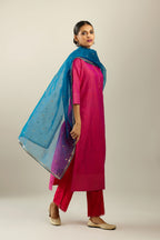 Raspberry silk hand crushed kurta set with concealed button placket neckline, highlighted with gold sequins.