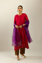 Red silk hand crushed kurta set with concealed button placket neckline, highlighted with gold sequins.