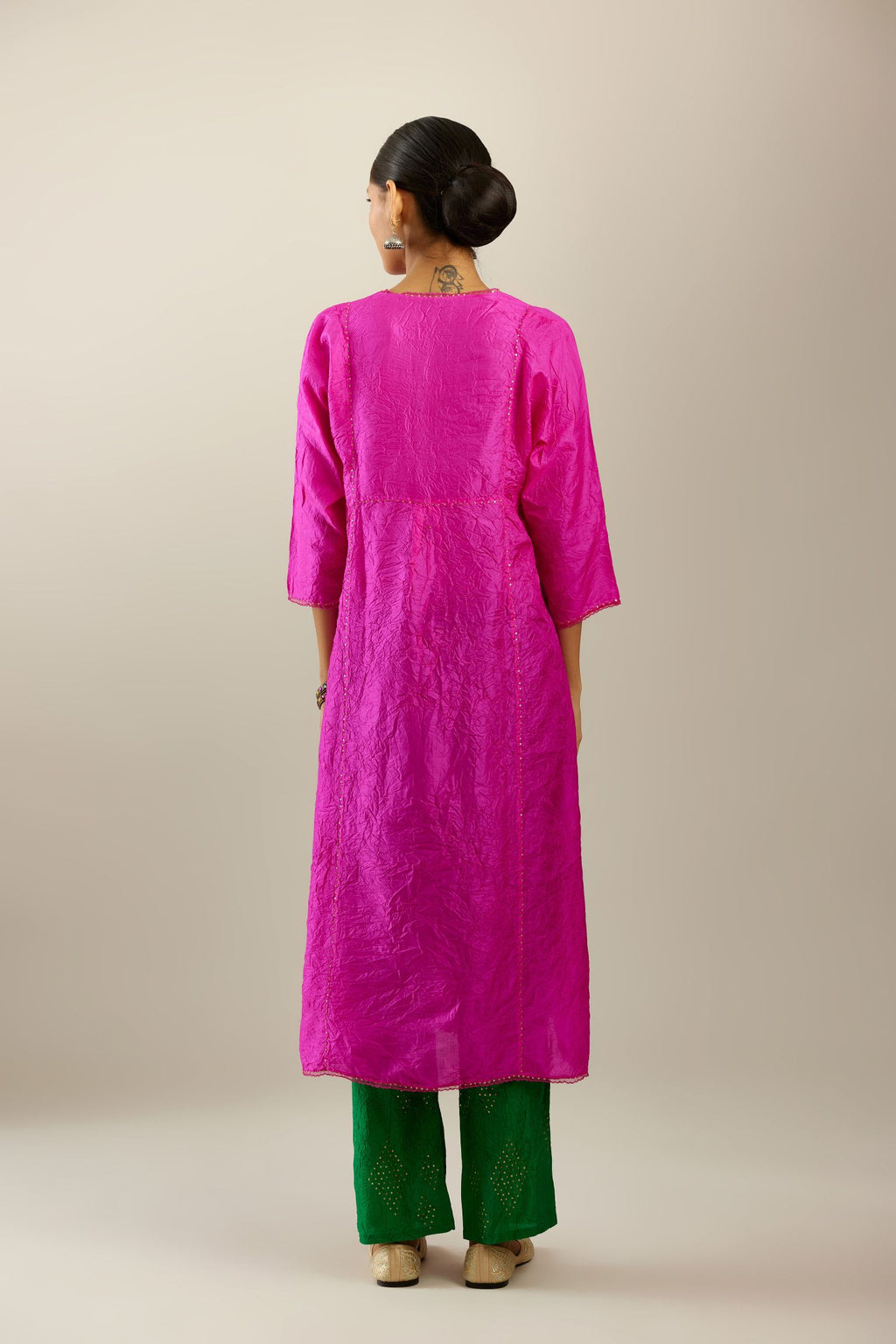 Silk hand crushed A-line kurta set, highlighted with gold sequins and embroidered scalloped edges.