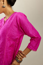 Silk hand crushed A-line kurta set, highlighted with gold sequins and embroidered scalloped edges.