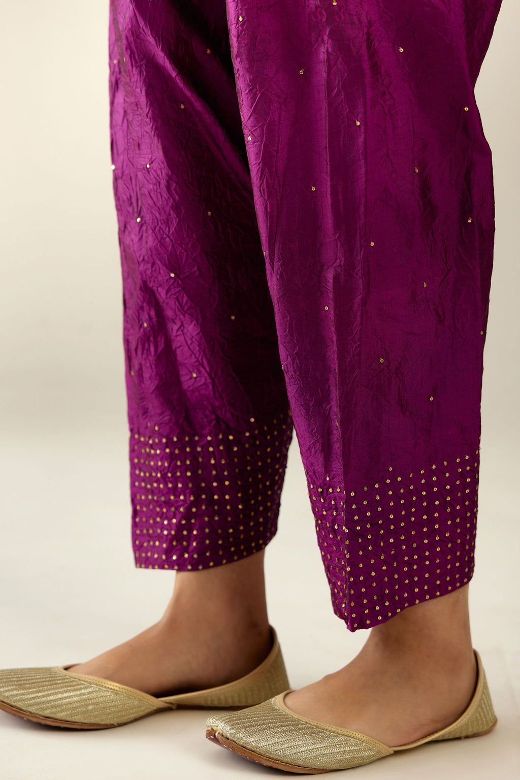 Sangria hand crushed pure silk narrow salwar detailed with gold sequins at hem.
