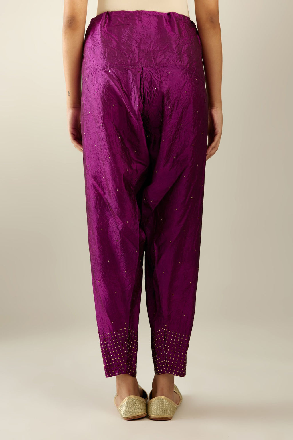 Sangria hand crushed pure silk narrow salwar detailed with gold sequins at hem.