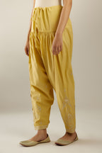 Yellow cotton narrow salwar with heavy zari and gota embroidery