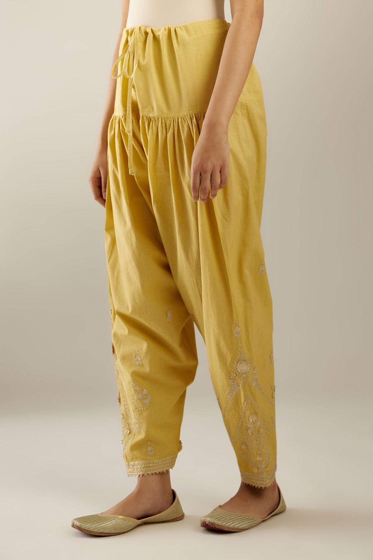 Yellow cotton narrow salwar with heavy zari and gota embroidery