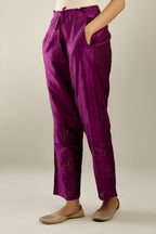 Sangria hand crushed silk pants with side pockets and assorted sequined butterflies till mid-calf length.