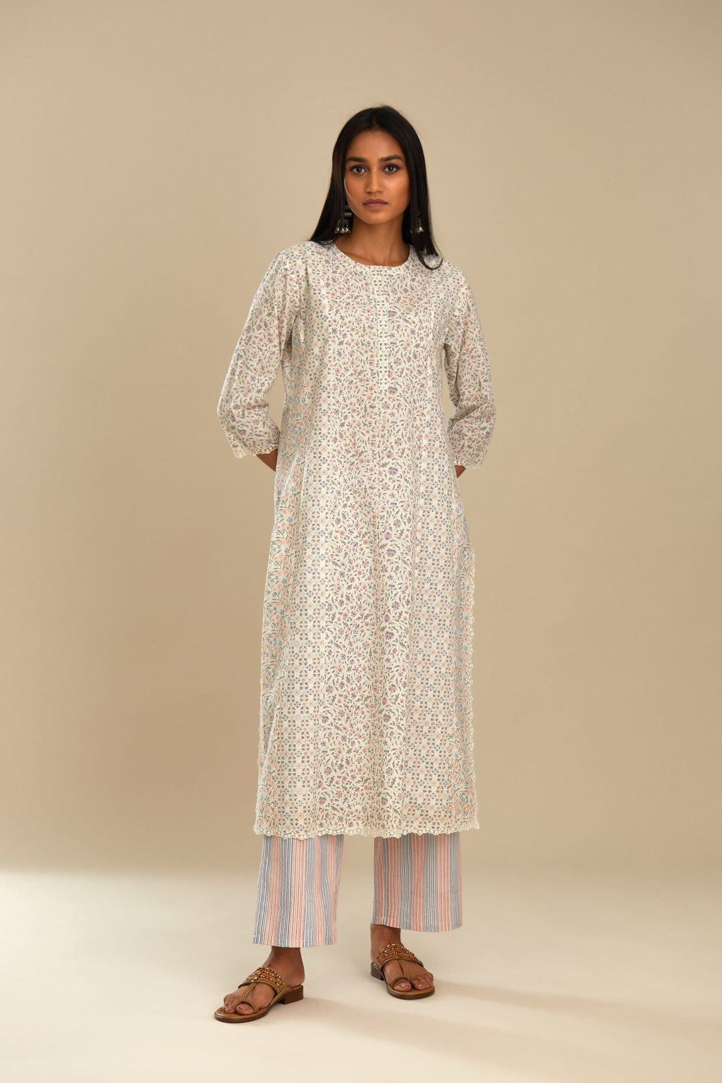 Pink cotton straight kurta set with button placket at front.