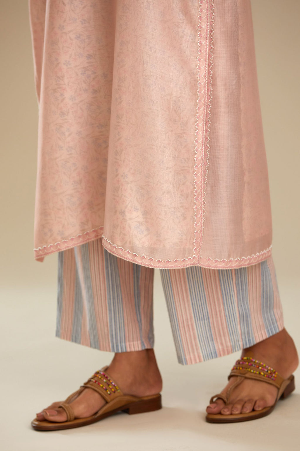 Pink V neck kurta set with thread and beads embroidery.