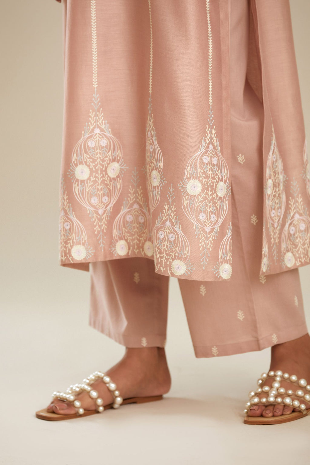 Silk chanderi straight kurta set with pastel silk thread embroidery.
