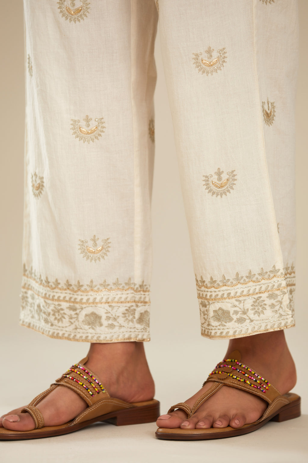Off white cotton straight pants with gold gota and zari embroidery