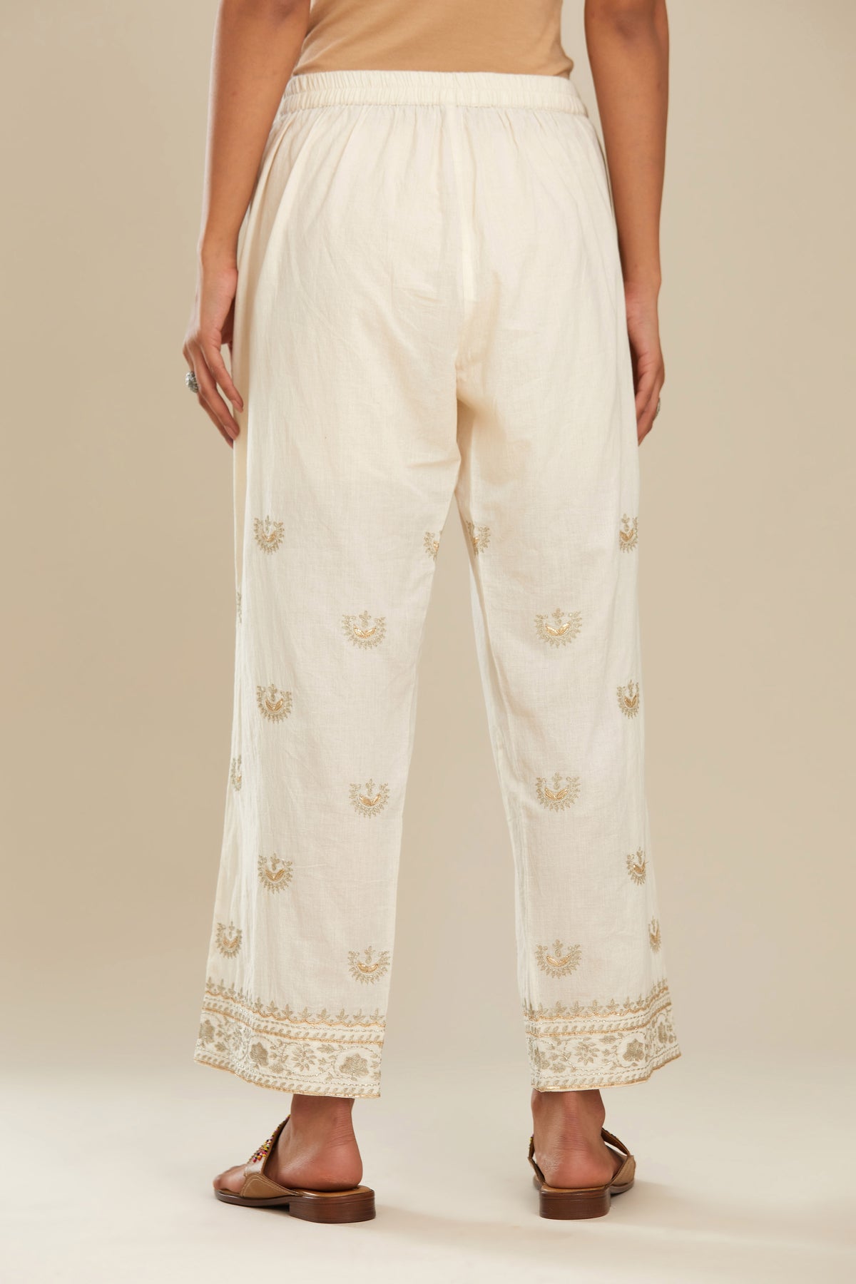 Off white cotton straight pants with gold gota and zari embroidery