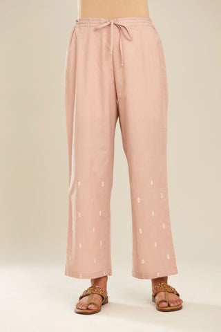 Old rose cotton straight pants with small booti embroidery.