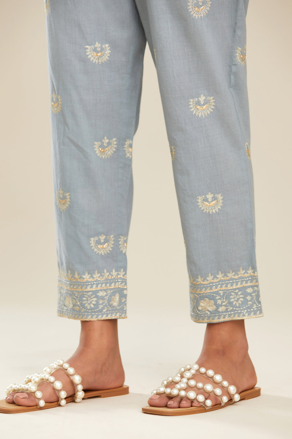 Powder blue cotton narrow pants with gold gota and zari embroidery