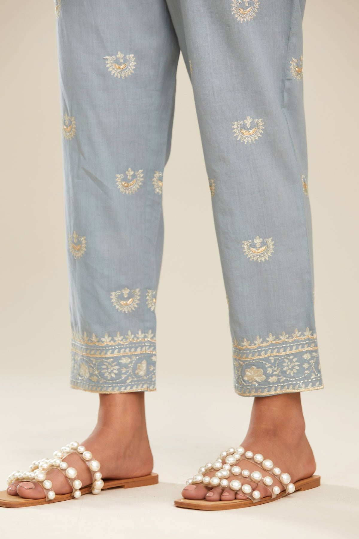Powder blue cotton narrow pants with gold gota and zari embroidery