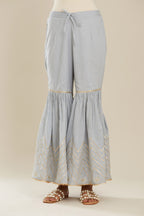 Powder blue farshi with gold gota work and gota patti lace at hem. (Farshi)