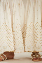 Off white farshi with gold gota work and gota patti lace at hem. (Farshi)
