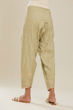 Sage green cotton narrow salwar with all-over gold gota and zari embroidery.
