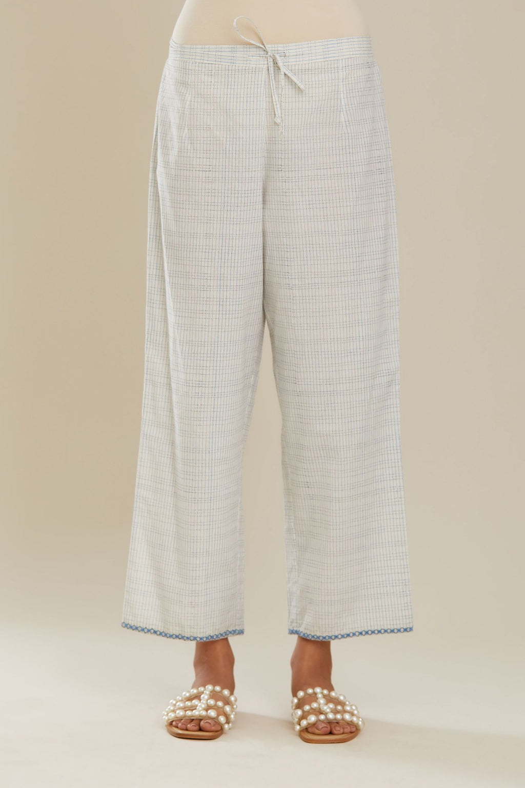 Off white hand block printed straight pants.