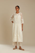 Off white cotton chanderi straight kurta set with cotton appliqué, highlighted with sequins.