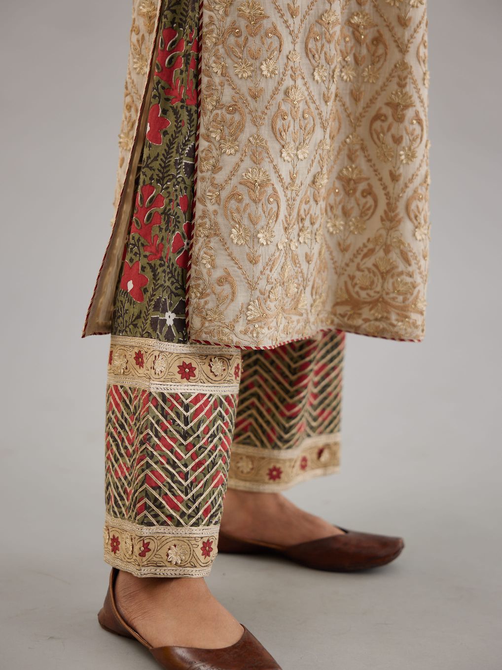 Off white cotton chanderi straight kurta set with all-over dori and gota embroidery, highlighted with gold sequin work.