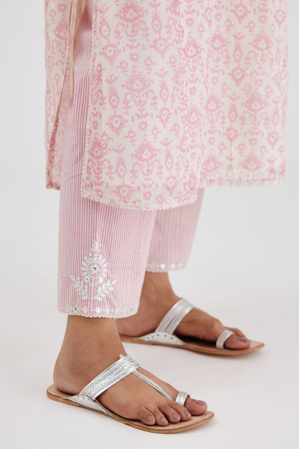 Ikat design pink and off white hand block-printed Cotton Chanderi straight long kurta set with round neck and front button placket.