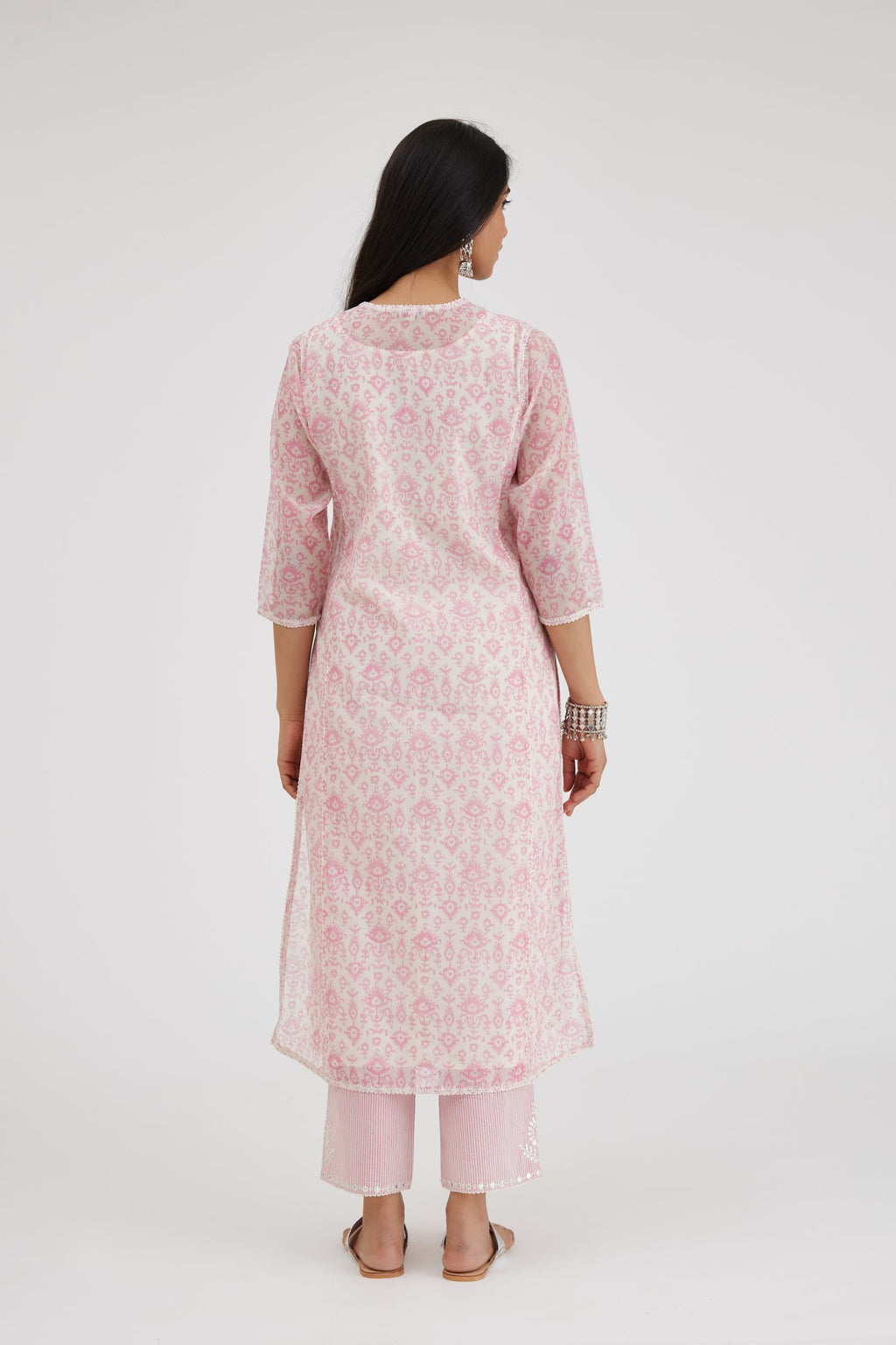 Ikat design pink and off white hand block-printed Cotton Chanderi straight long kurta set with round neck and front button placket.