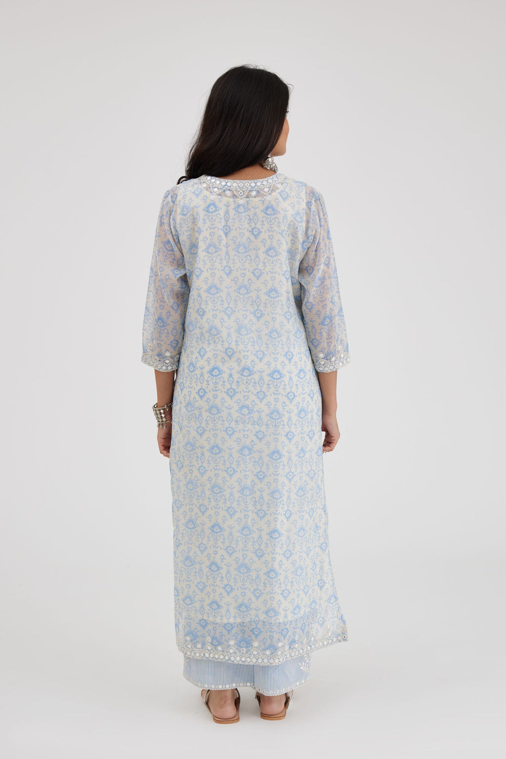 Ikat design blue and off white hand block-printed Cotton Chanderi straight long kurta set with off-white thread and mirror embroidery.