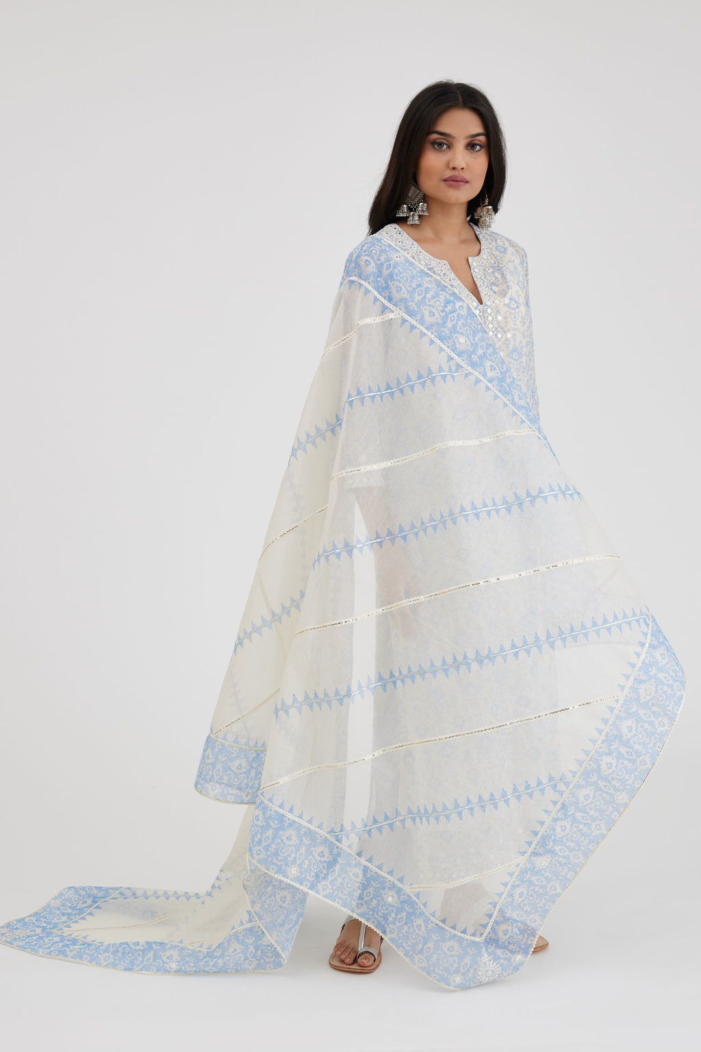 Ikat design blue and off white hand block-printed Cotton Chanderi straight long kurta set with off-white thread and mirror embroidery.
