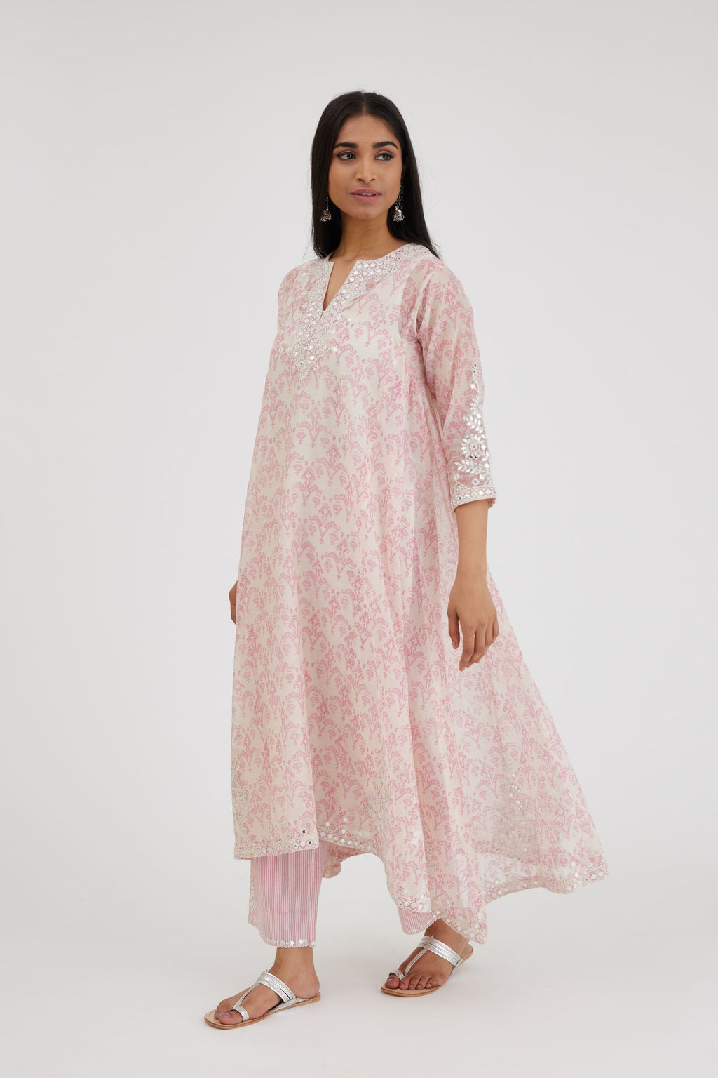 Ikat design pink and off white hand block-printed Cotton Chanderi panelled and asymmetric hem long kurta set with off-white thread and mirror embroidery.