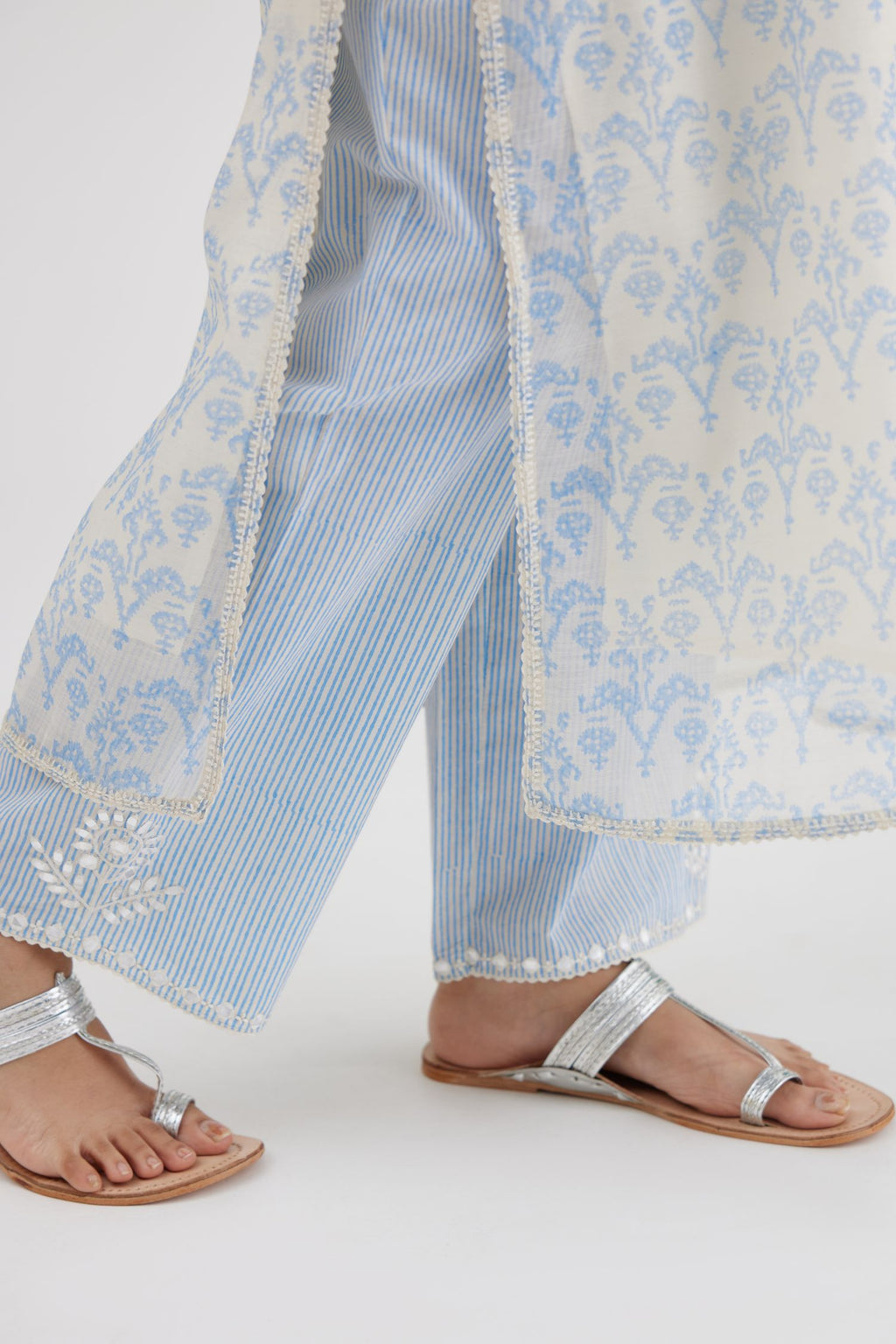 Ikat design blue and off white hand block-printed Cotton Chanderi straight long kurta set with off-white thread embroidery.