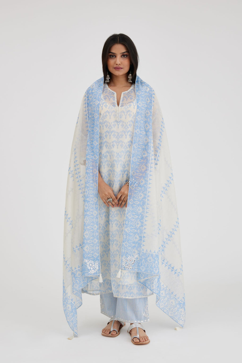 Ikat design blue and off white hand block-printed Cotton Chanderi straight long kurta set with off-white thread embroidery.
