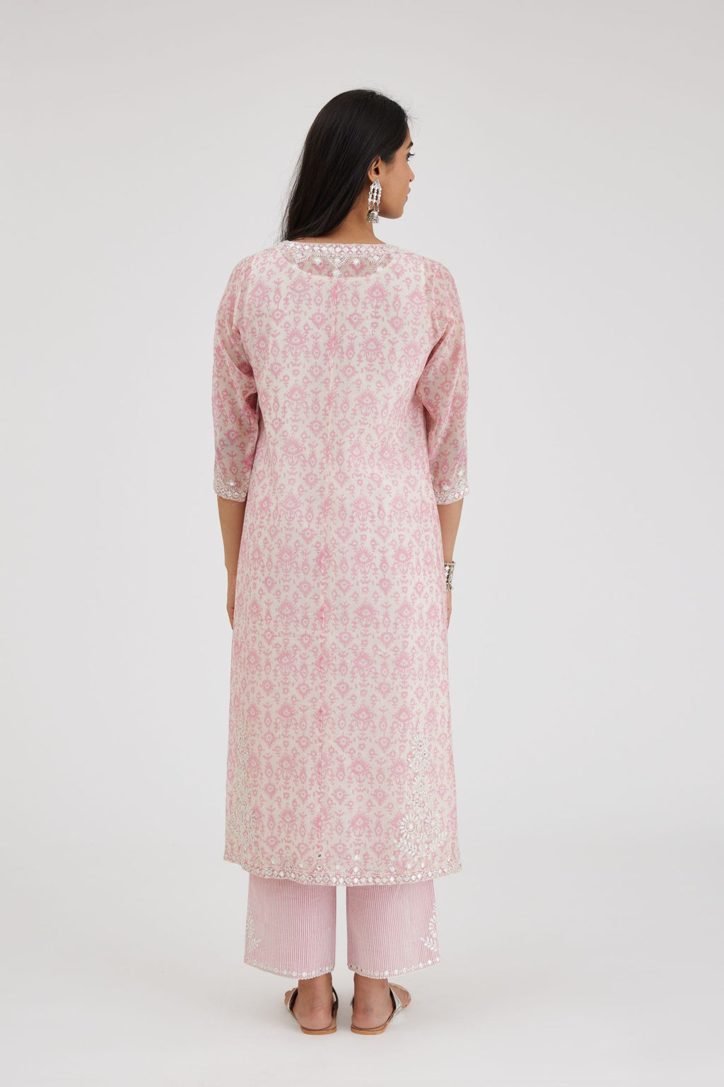 Ikat design pink and off white hand block-printed Cotton Chanderi straight long kurta set dress with off-white thread and mirror embroidery.