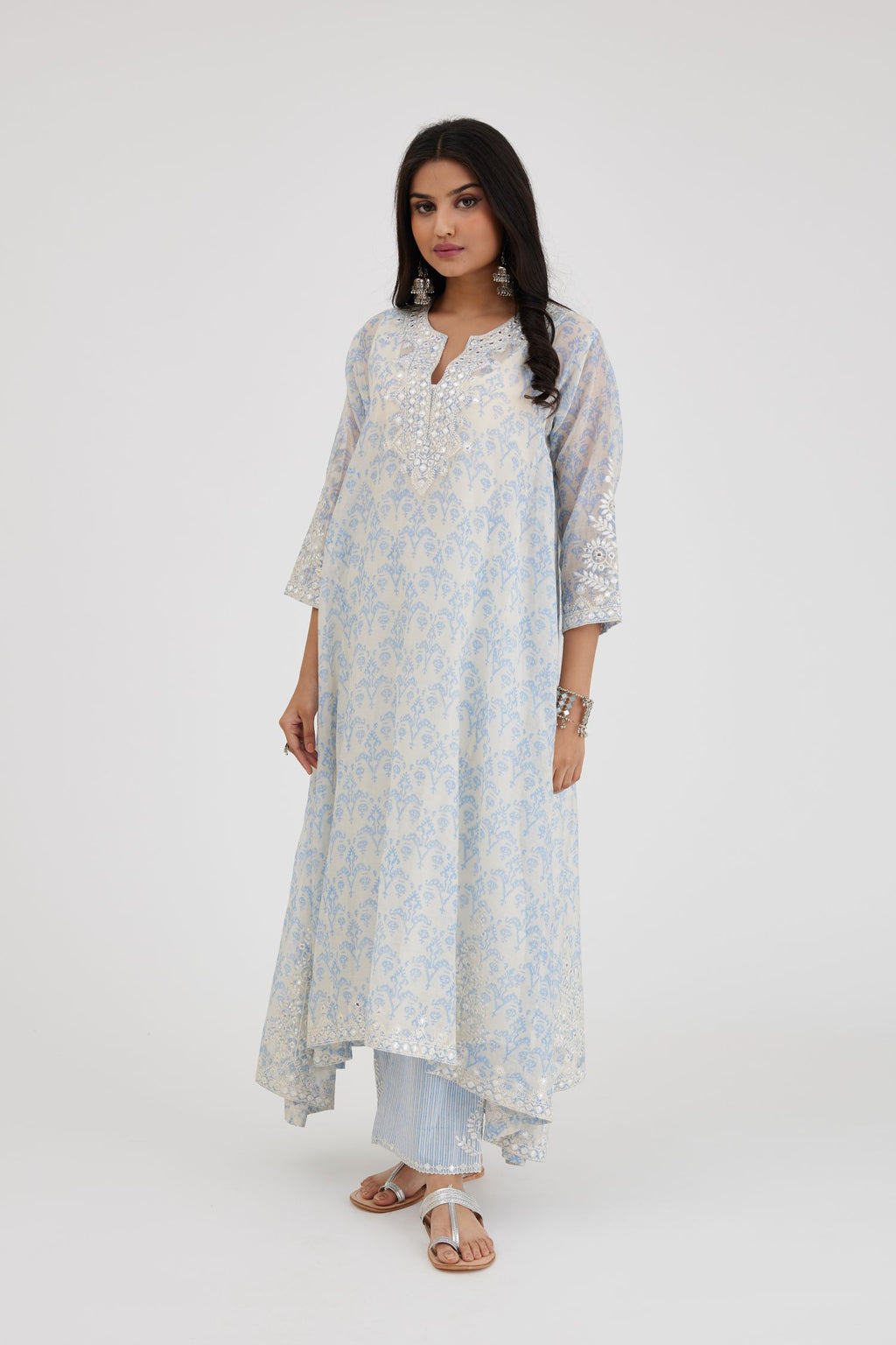 Ikat design blue and off white hand block-printed Cotton Chanderi panelled and asymmetric hem long kurta set with off-white thread and mirror embroidery.