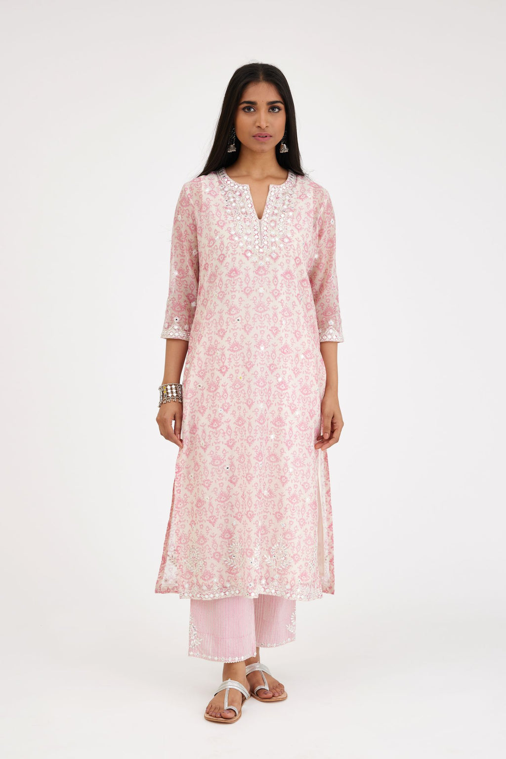 Ikat design pink and off white hand block-printed Cotton Chanderi straight long kurta set with round neck, highlighted with off-white thread and mirror embroidery.