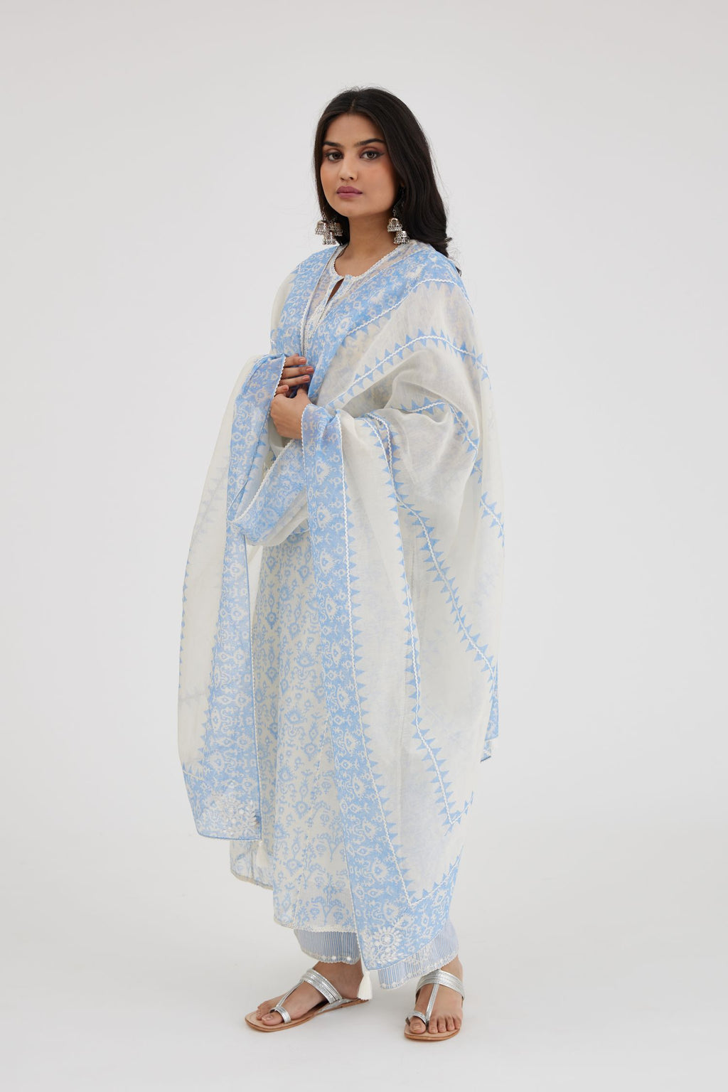 Ikat design blue and off white hand block-printed Cotton Chanderi straight long kurta set with round neck and front button placket.