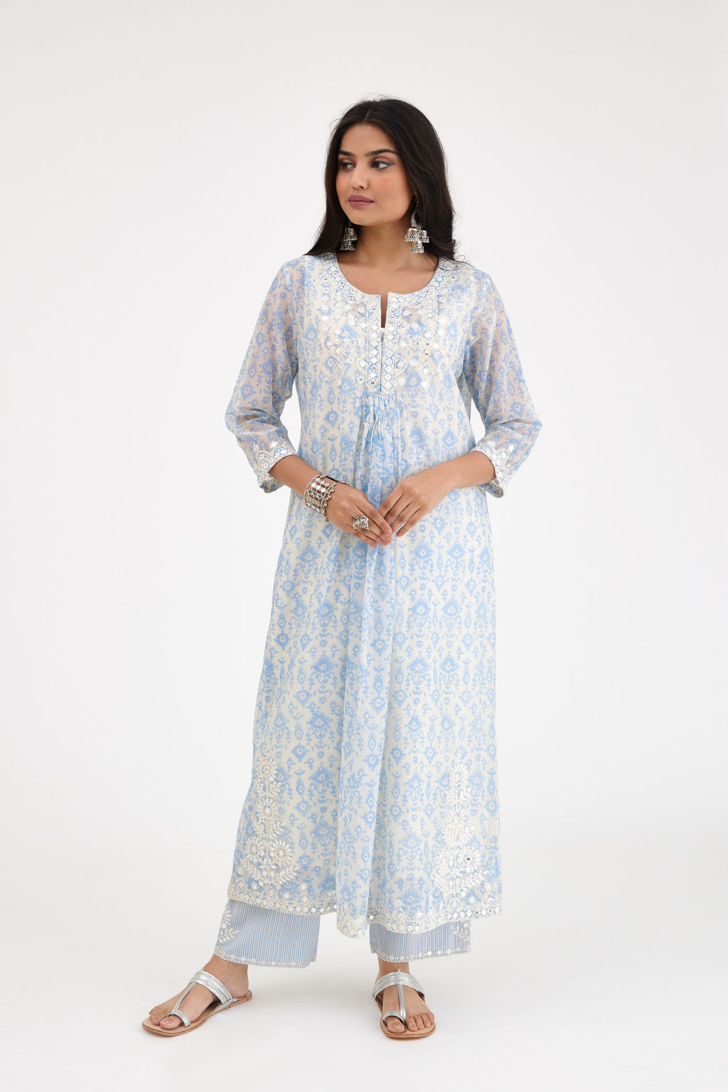 Ikat design blue and off white hand block-printed Cotton Chanderi straight long kurta set dress with off-white thread and mirror embroidery.