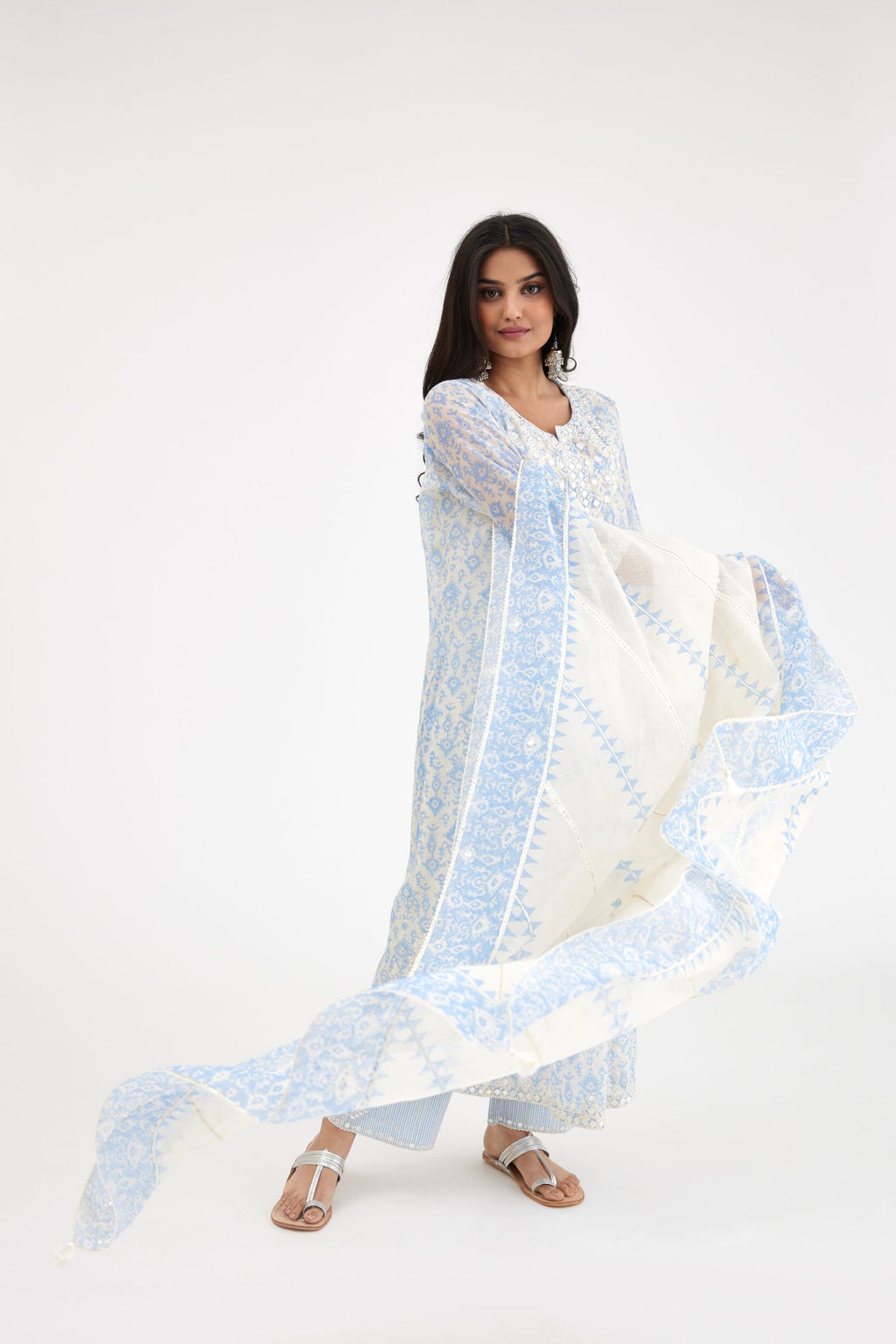 Ikat design blue and off white hand block-printed Cotton Chanderi straight long kurta set dress with off-white thread and mirror embroidery.