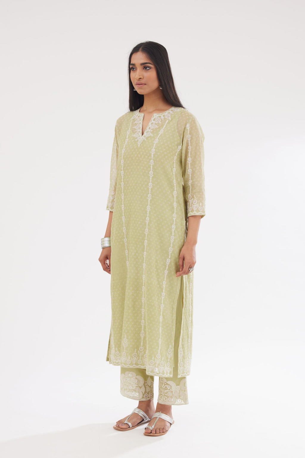 Green cotton chanderi hand block printed kurta set with dori and silk thread chhari - stripes, all over and heavier butas at hem.