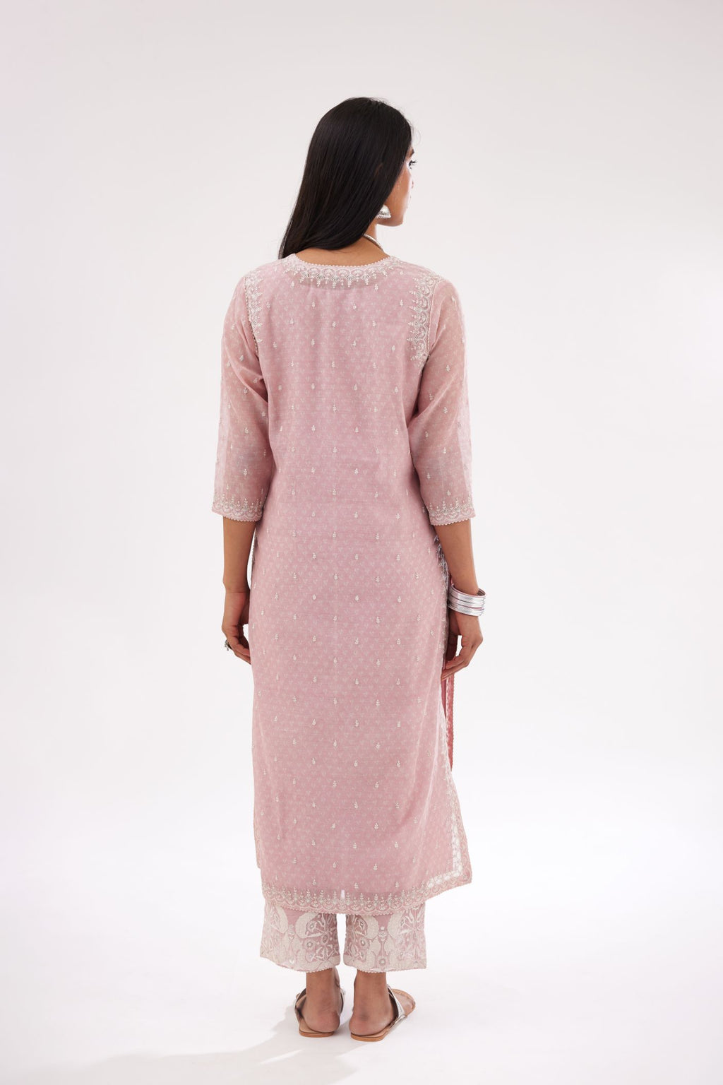 Pink cotton chanderi hand block printed kurta set with dori and silk thread embroidery at the neck, armholes, hem and sleeve cuffs.