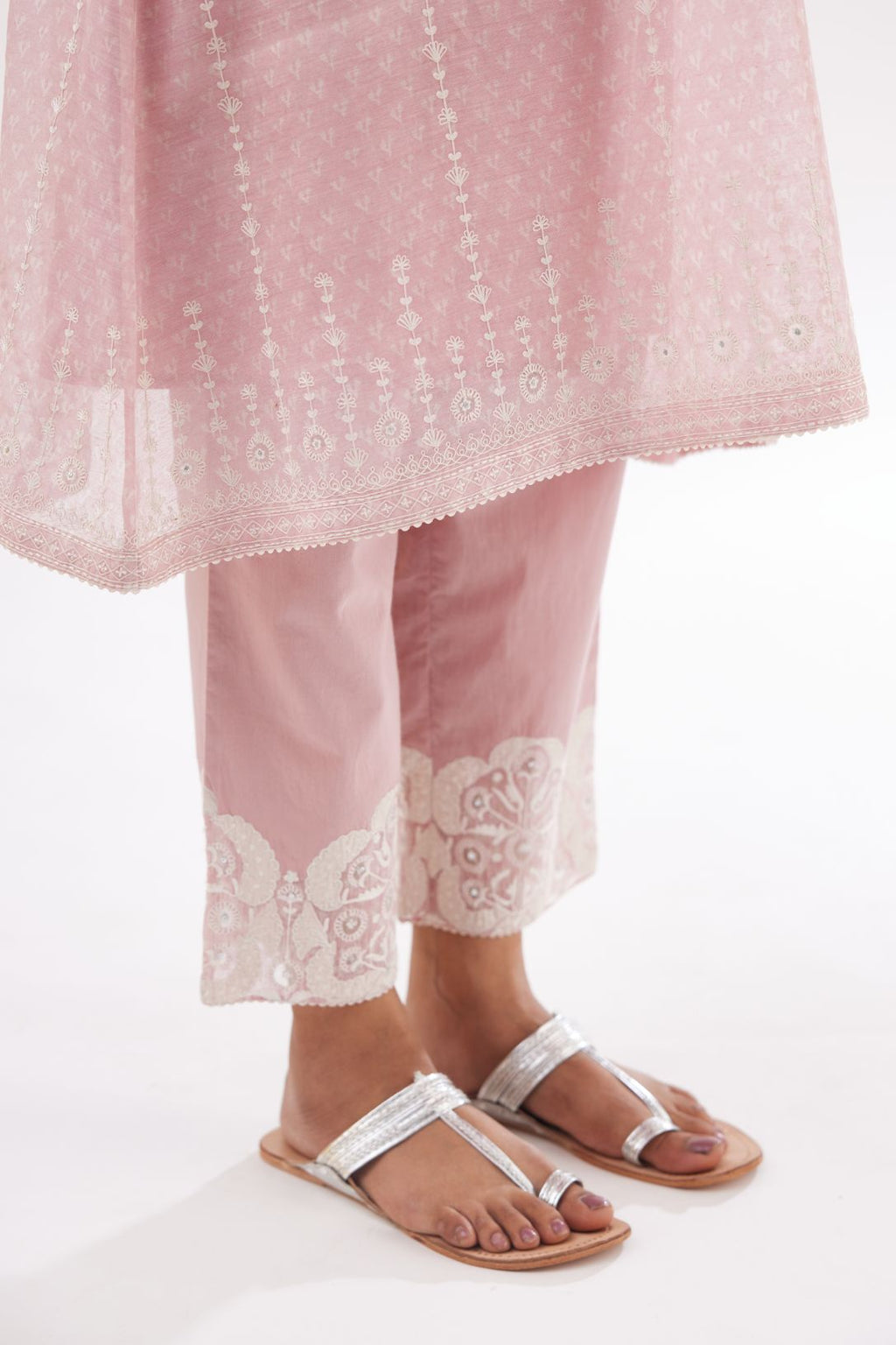 Pink hand block printed cotton chanderi A-line short kurta set with all over delicate dori and silk thread embroidery stripes.