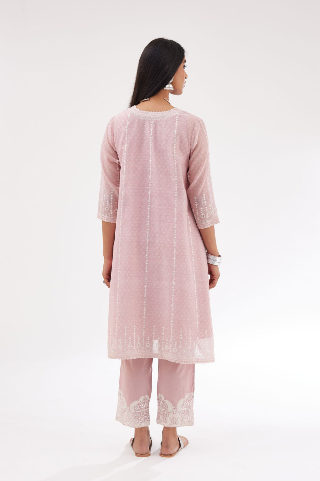 Pink hand block printed cotton chanderi A-line short kurta set with all over delicate dori and silk thread embroidery stripes.