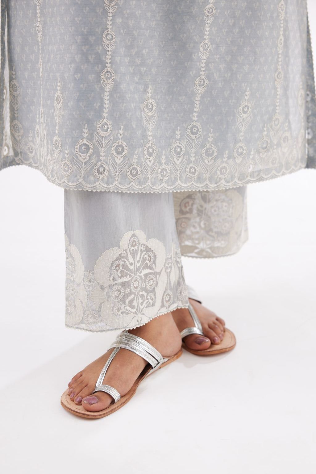 Blue cotton chanderi hand block printed kurta set with dori and silk thread chhari - stripes, all over and heavier butas at hem.