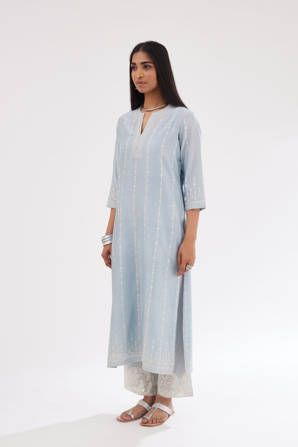 Blue silk chanderi straight kurta set with all over dori and silk thread embroidery.