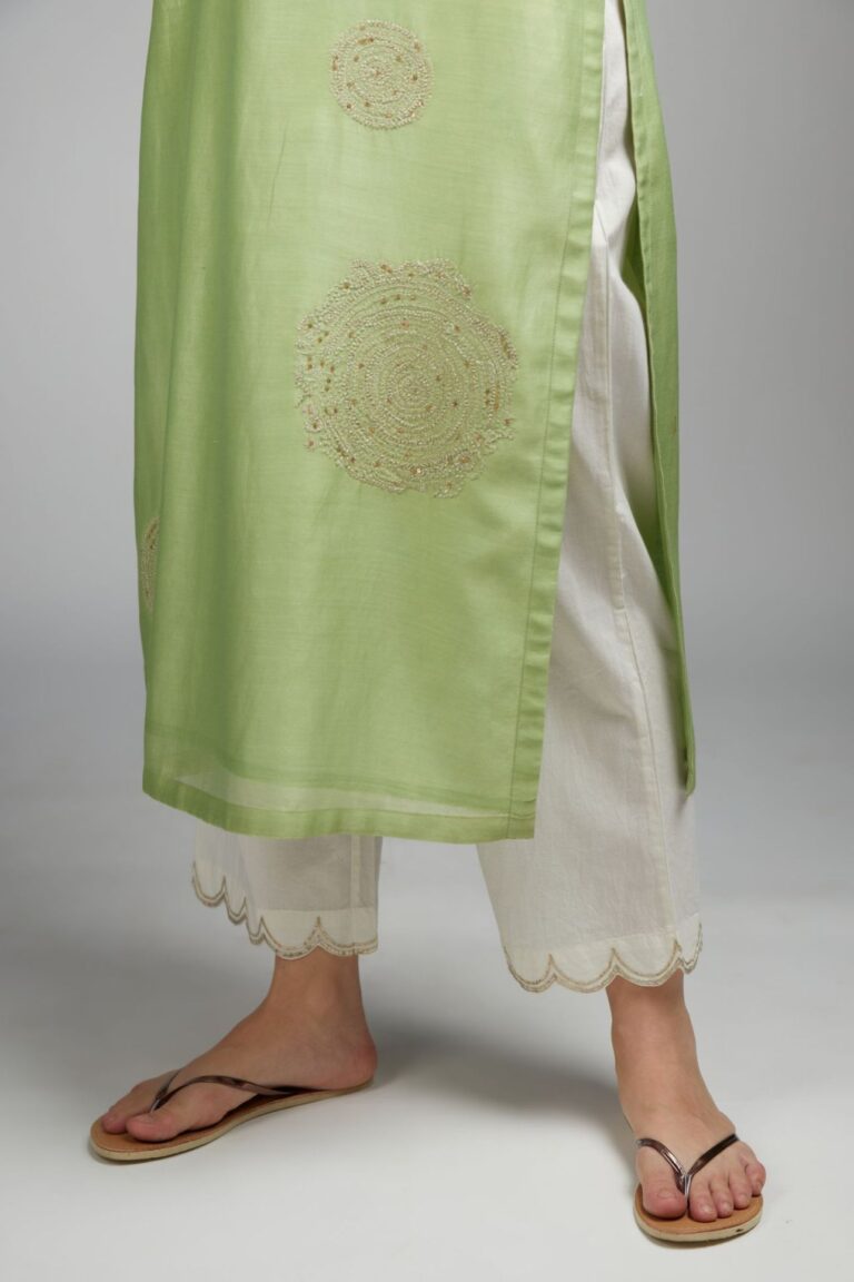 Lime green straight kurta set with gold zari embroidery in front and back.