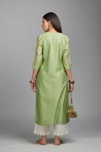 Lime green straight kurta set with gold zari embroidery in front and back.