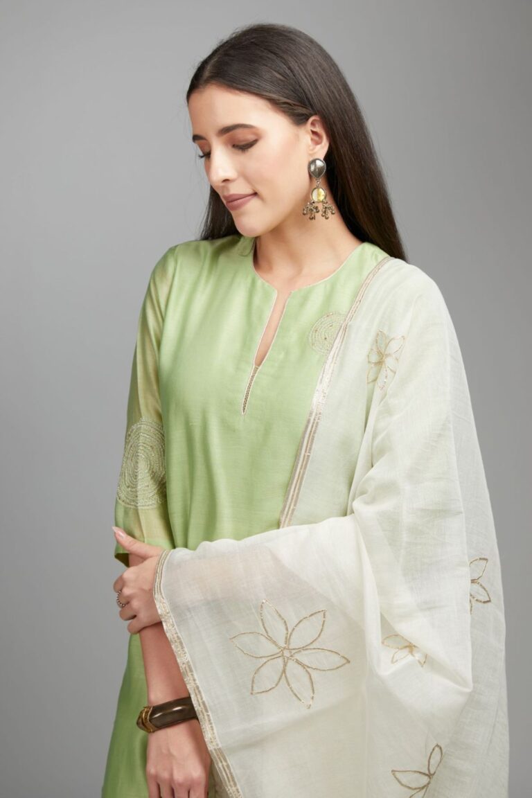Lime green straight kurta set with gold zari embroidery in front and back.