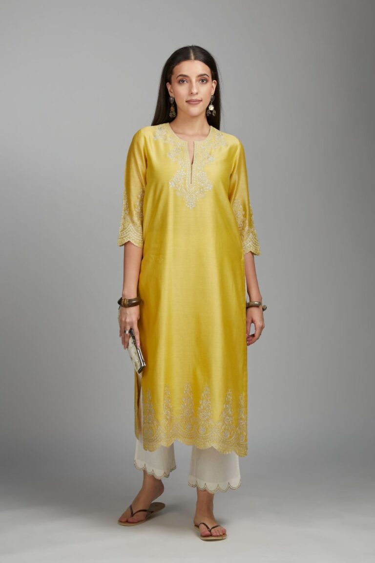 Yellow straight kurta set with silver zari embroidery at neck and scalloped hem