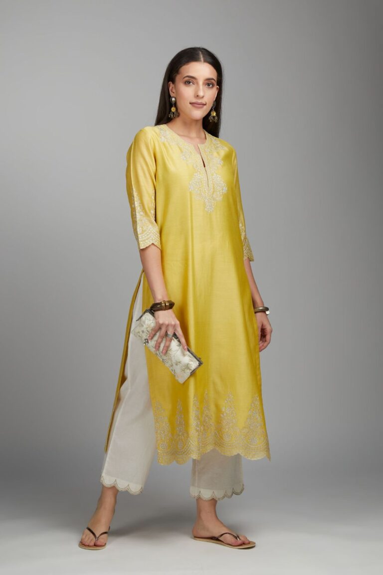 Yellow straight kurta set with silver zari embroidery at neck and scalloped hem
