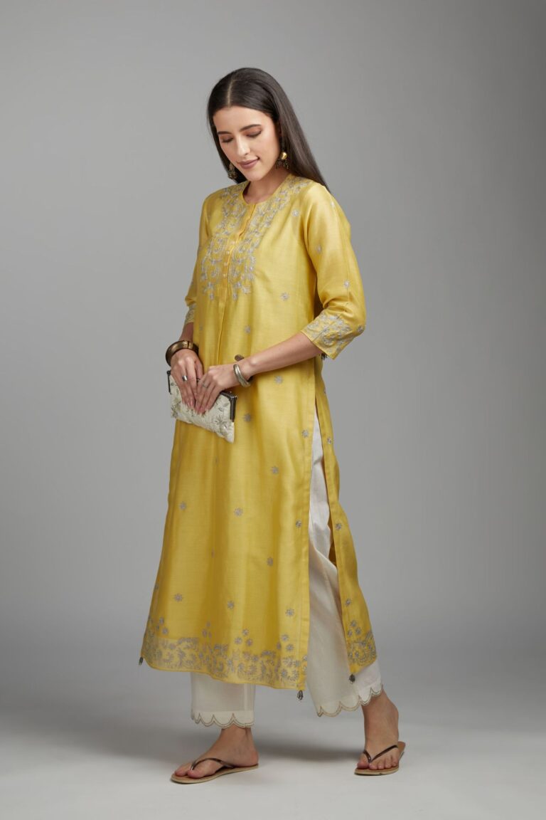 Yellow straight kurta set with silver zari embroidery and round neckline with button placket in the front