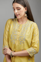 Yellow straight kurta set with silver zari embroidery and round neckline with button placket in the front