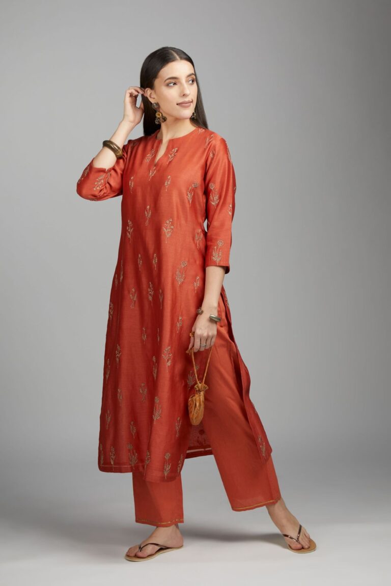 Rust straight kurta set with all-over dull gold zari embroidery